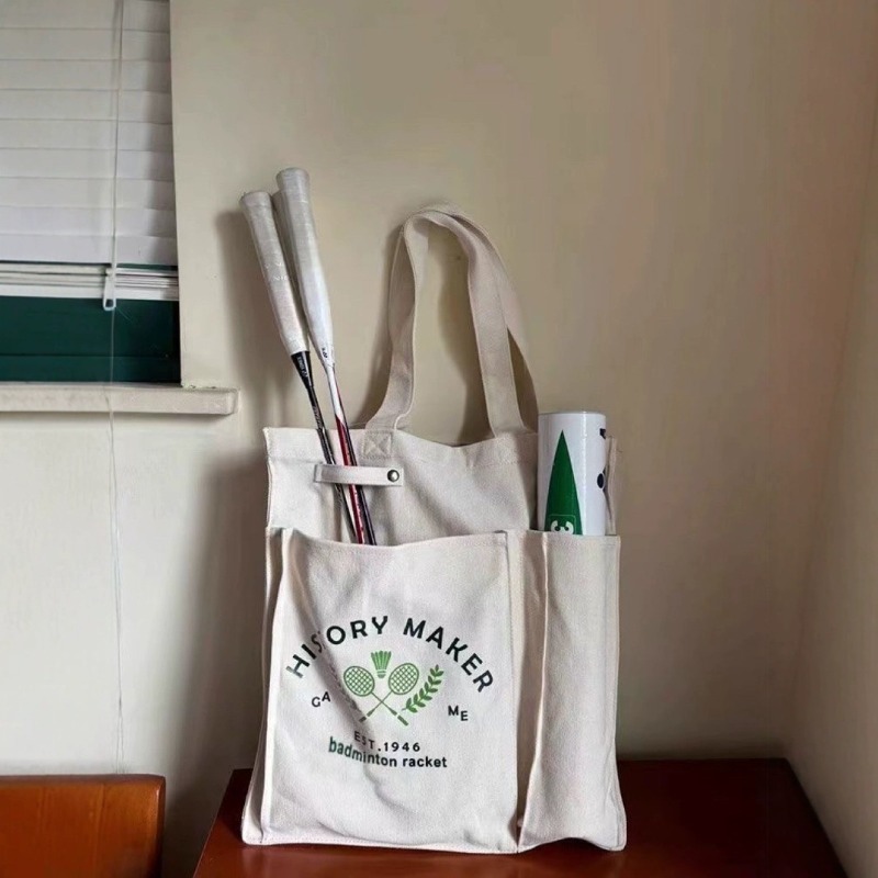 Badminton Bag - กระเป๋าใส่ไม้แบดมินตันรุ่นใหม่ ทำจากผ้าแคนวาส ขนาดกว้างขวาง เหมาะสำหรับกีฬาและฟิตเนส กระเป๋าสะพายไหล่ข้างเดียวที่มีดีไซน์ทันสมัยสำหรับผู้หญิง